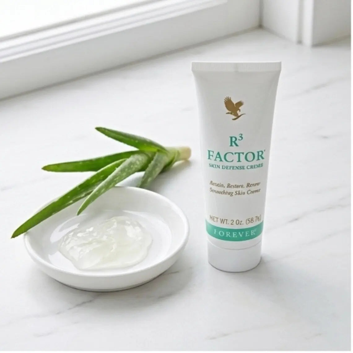 Product texture shot showing the smooth white creme in a minimalist spa-like setting.