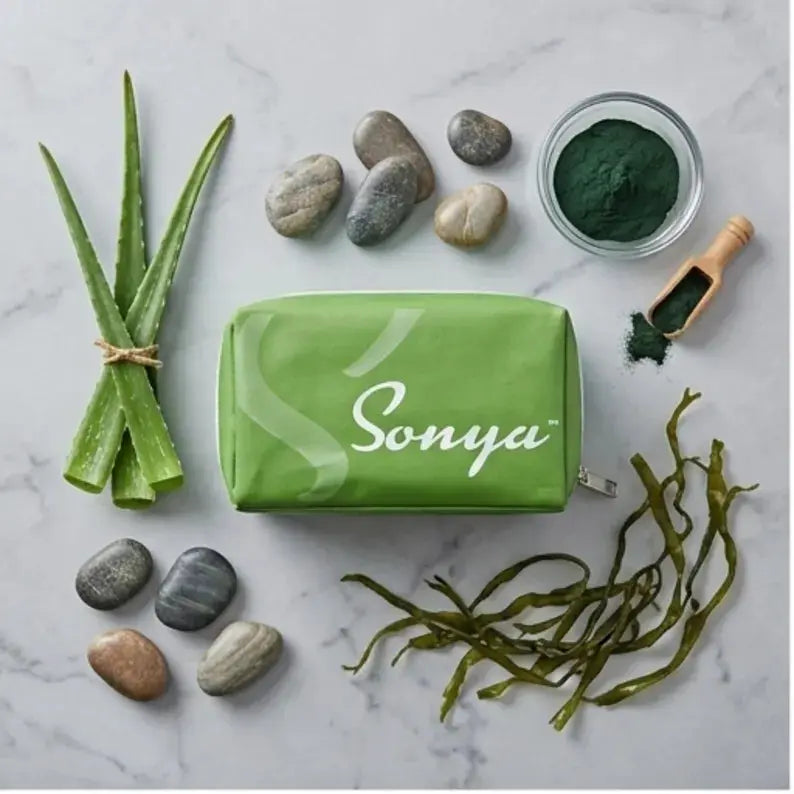 Close-up of the key ingredients: Aloe Vera leaf and Baobab fruit.